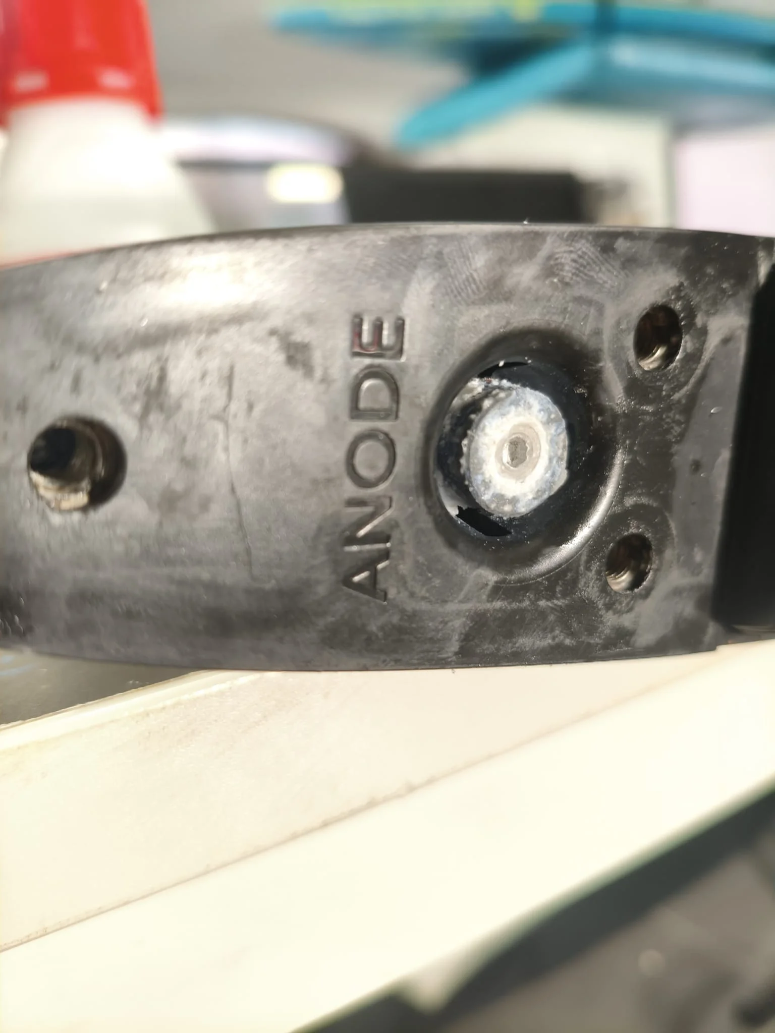 Heavily wasted Fliteboard anode showing chalky salt-water deposit pattern — mid-season check