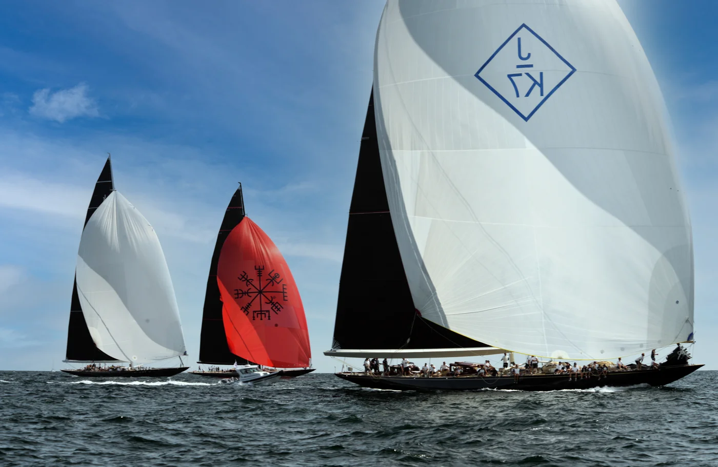 J-Class yachts Velsheda, Topaz and Svea racing downwind at the J-Class World Championships, Newport 2017