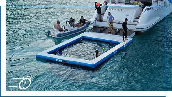 Superyacht inflatable sea pool with guests