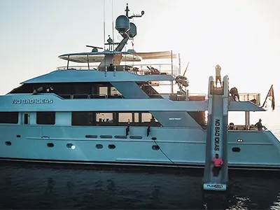 Inflatable yacht slide attached to superyacht