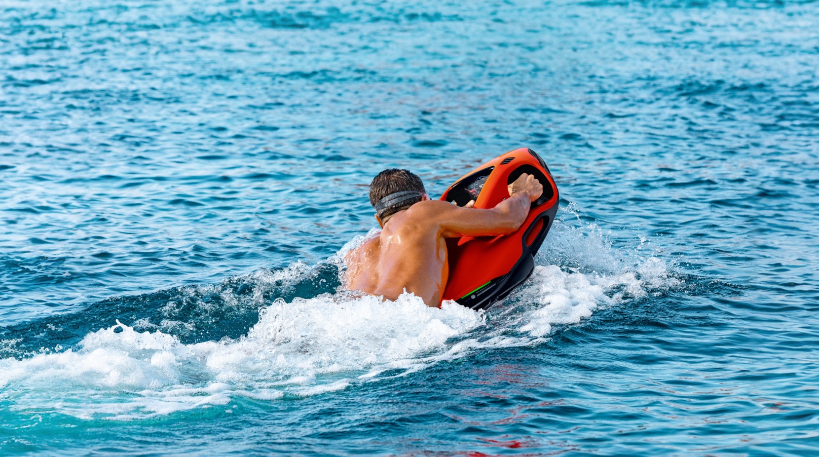 Seabob cutting hard through Mediterranean water under heavy charter-week use &mdash; the operational intensity clause 8 is built around