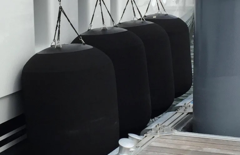 Superyacht inflatable ball fenders deployed alongside hull with double-braid dock line