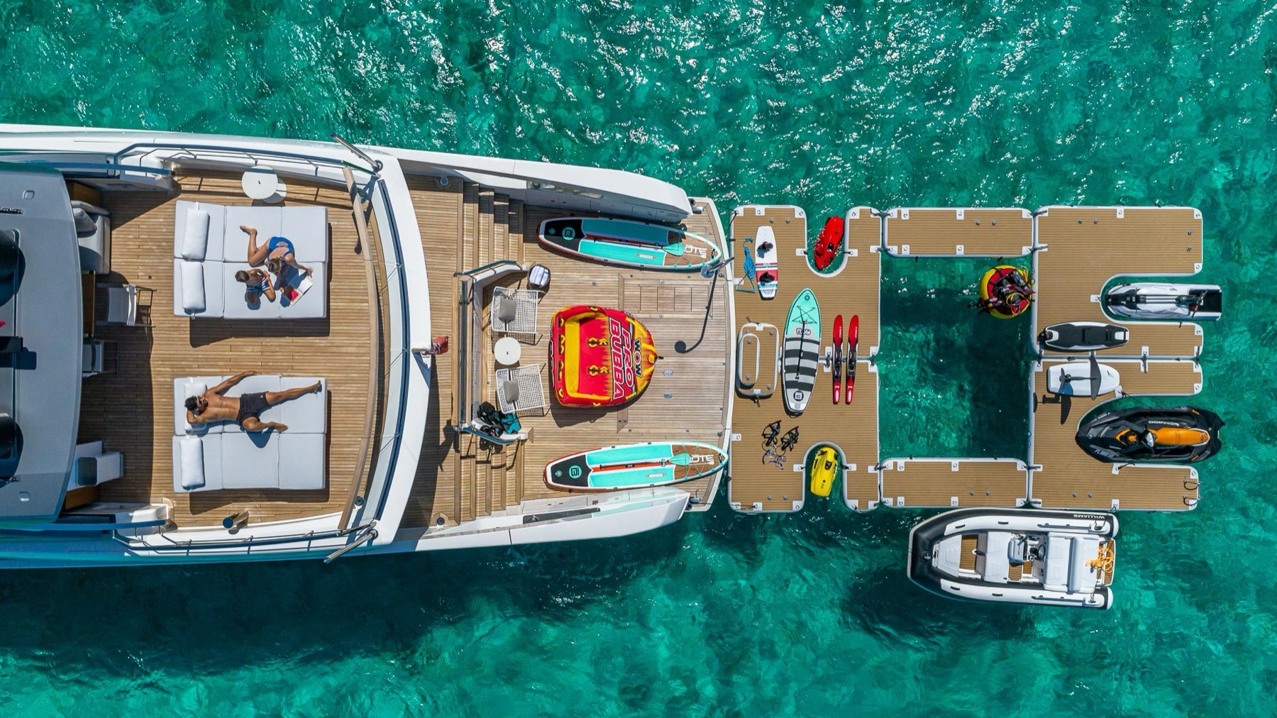 SEARAFT inflatable work platforms behind superyacht