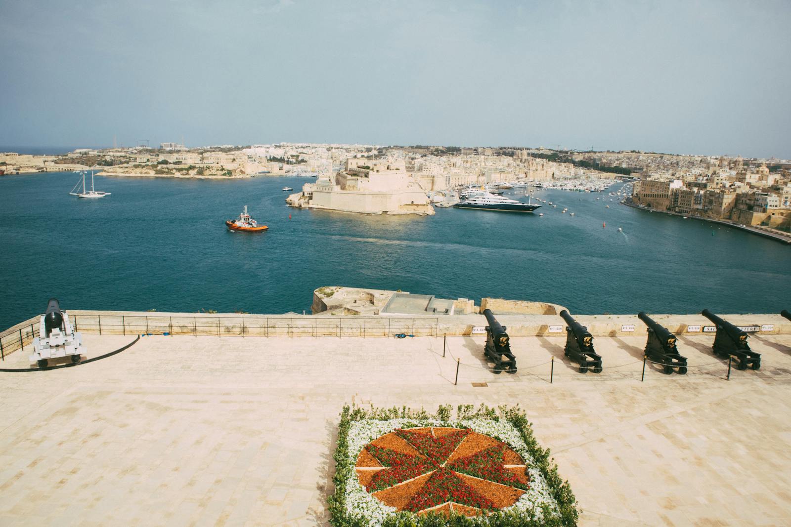 Valletta skyline from inside Grand Harbour with yachts in foreground