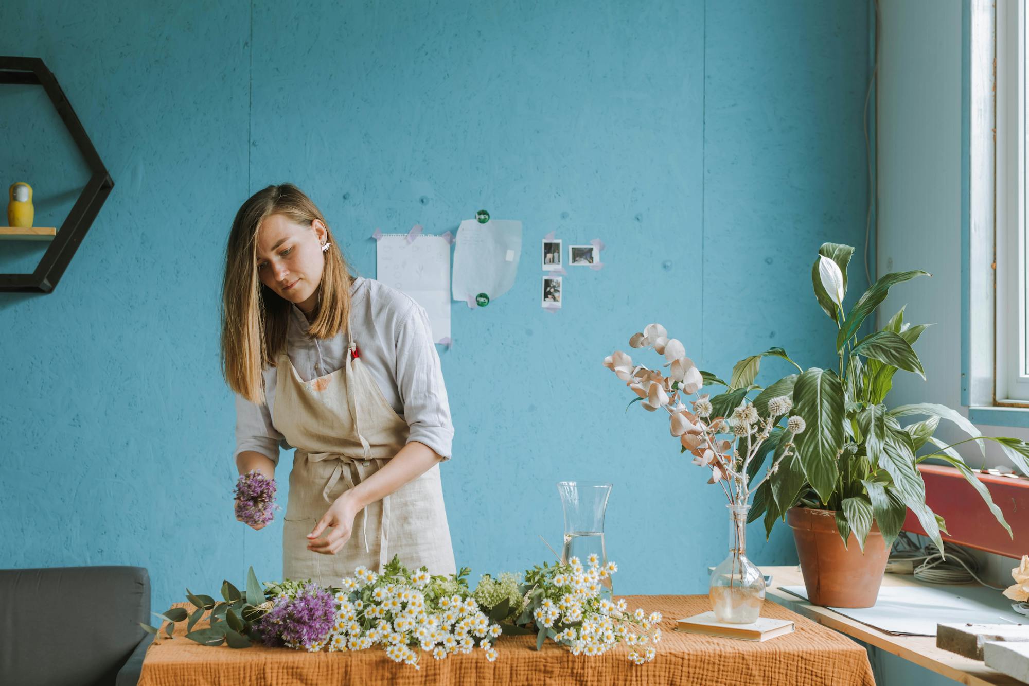 Floral arrangement being prepared &mdash; Mercer Yachting curated floral sourcing