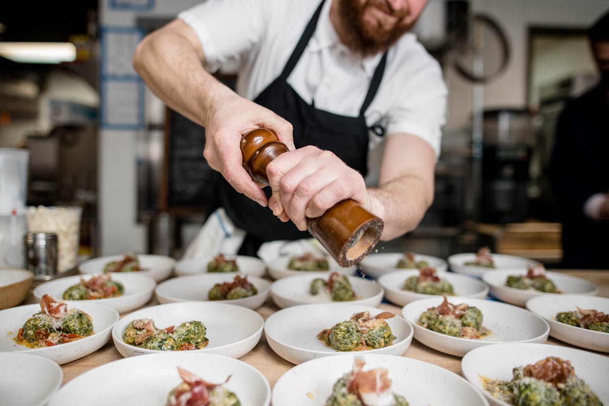 Yacht galley chef working at counter