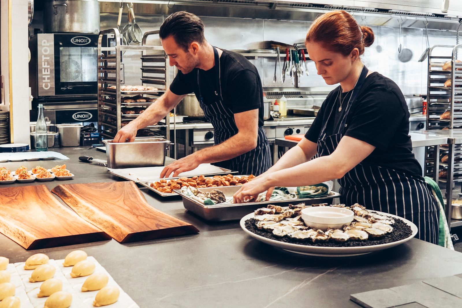 Yacht galley chef preparing fresh produce &mdash; Mercer Yachting galley supply